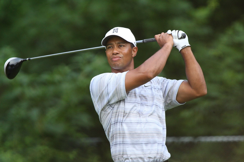 Tiger_Woods_drives_by_Allison_Keith-Allison_2.0